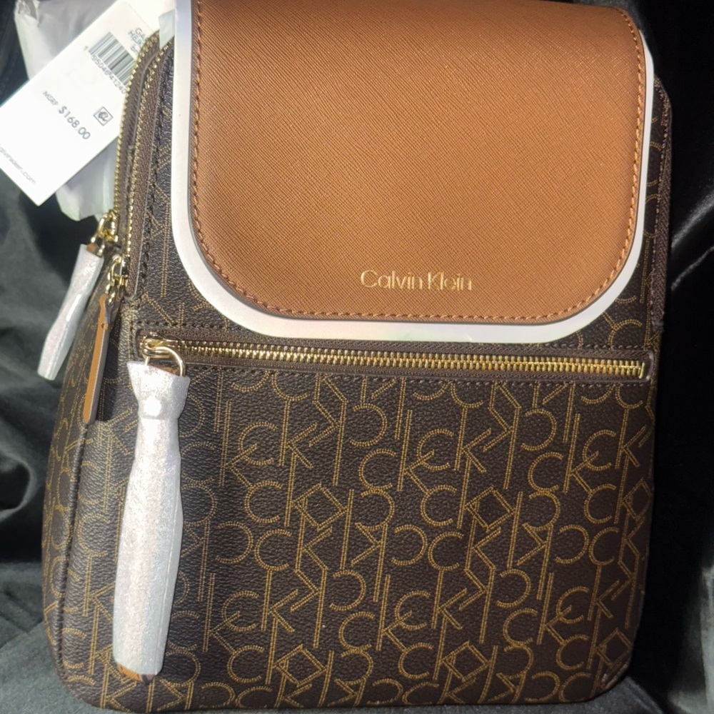Calvin Klein Brown Monogram Backpack with Tan Flap and White Trim
